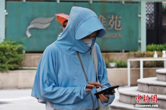 全副“捂”裝迎戰高溫你身上的防曬衣靠得住嗎？