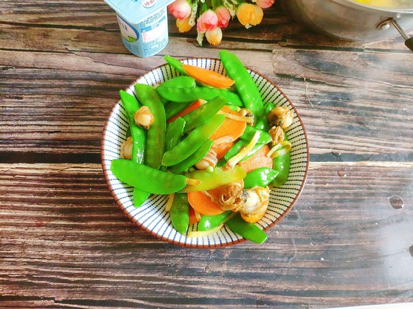 荷蘭豆炒螺肉的做法-家常味炒菜譜