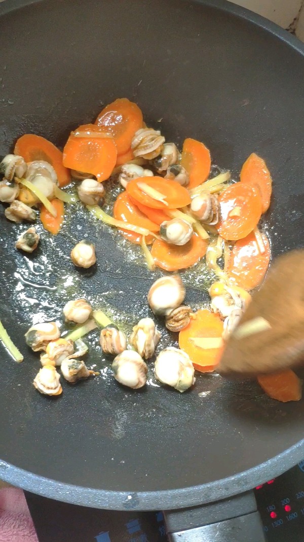 荷蘭豆炒螺肉的做法-家常味炒菜譜