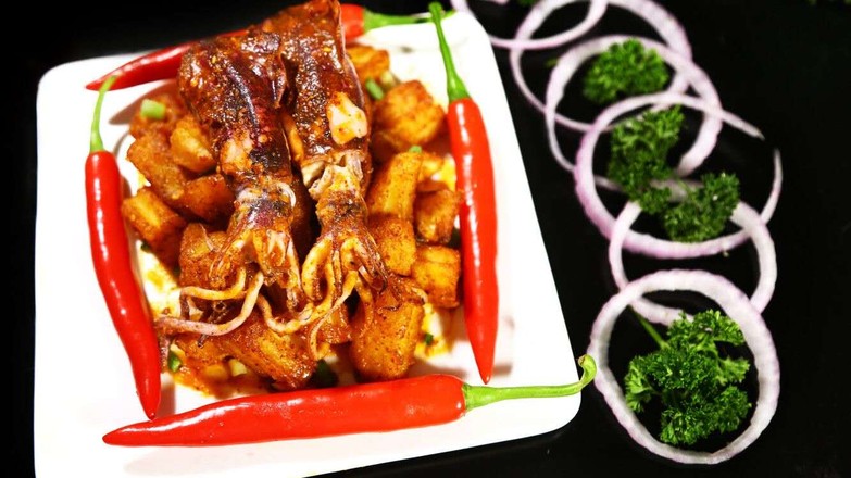 金江小姑娘土豆爆魷魚的做法-麻辣味烤菜譜