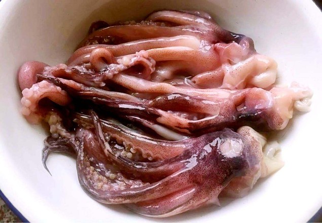 金江小姑娘土豆爆魷魚的做法-麻辣味烤菜譜