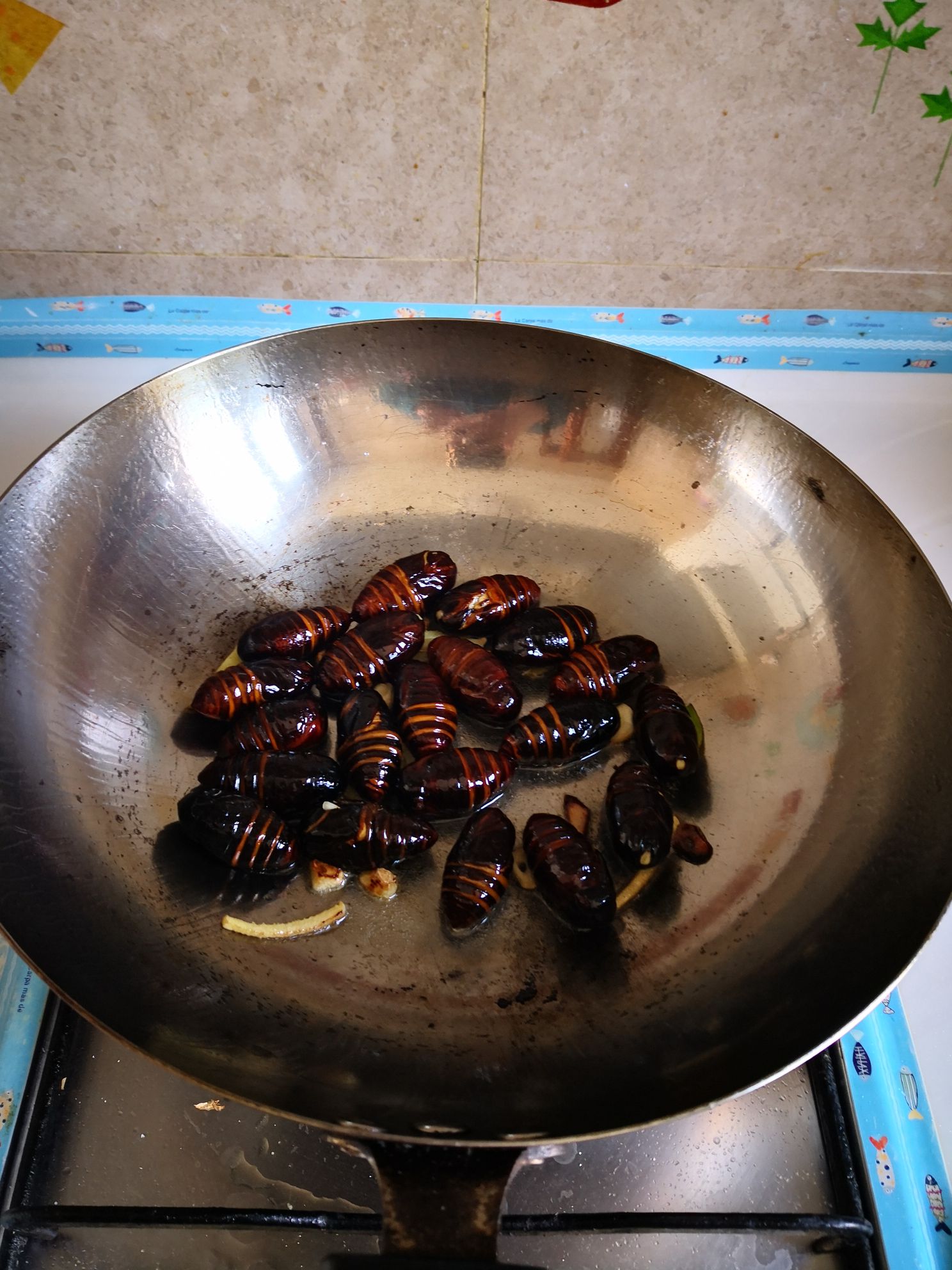 蔥香繭蛹的做法-家常味炒菜譜