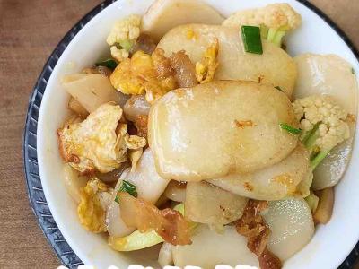 油渣花菜炒年糕的做法-家常味炒菜譜
